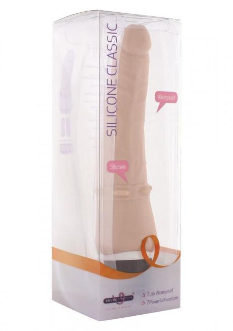 Телесный вибромассажёр с юбочкой шипов Classic Smooth Vibrator Nude - 16,5 см., Seven Creations